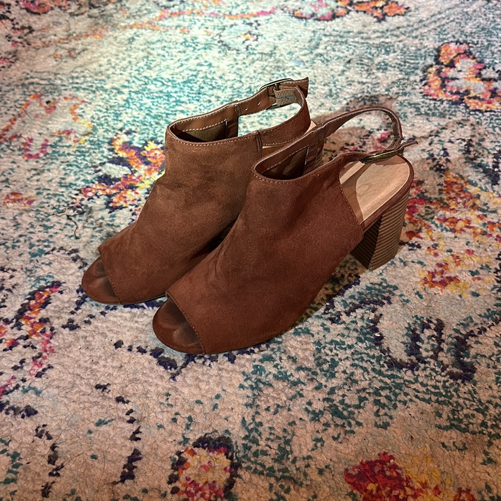 Sling back wedge sandals.